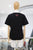 T-shirt negra cerezas