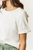 Playera blanca trenza