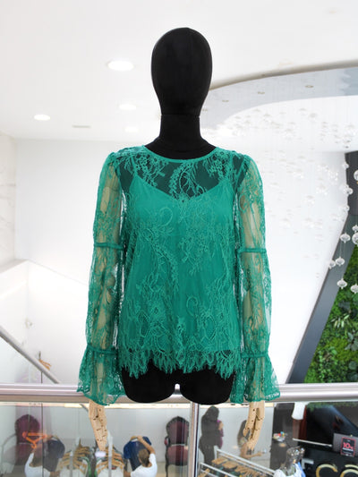 Blusa encaje verde 20/10%