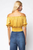 Blusa off-shoulders mostaza