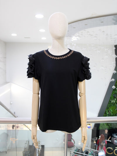 Blusa negra manga flor