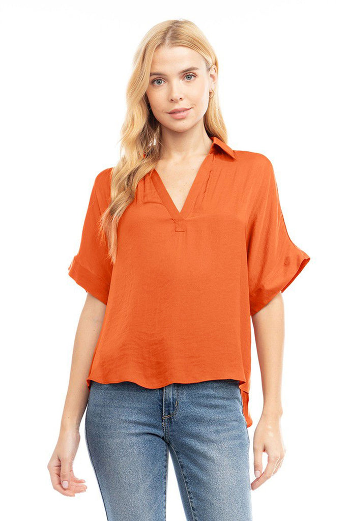 Blusa naranja camisera