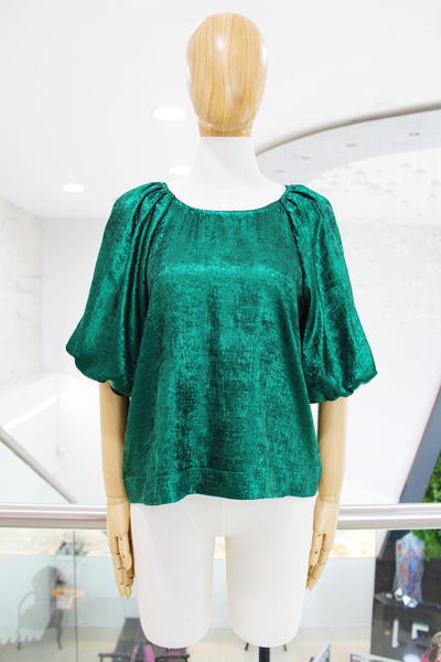 Blusa metalizada verde