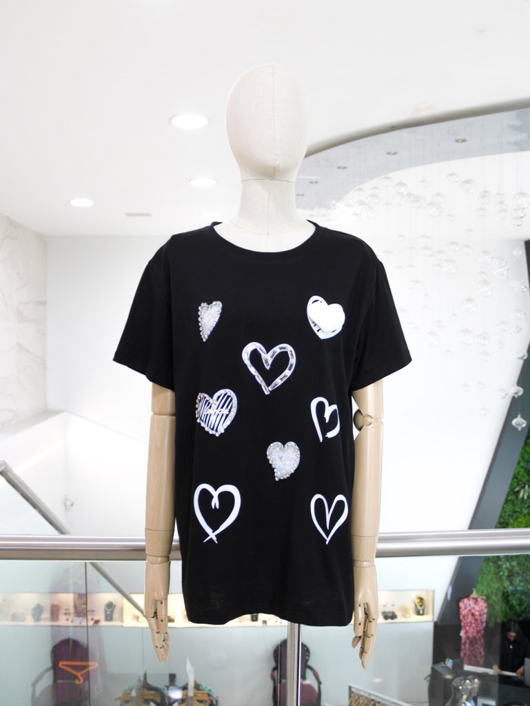 Blusa negra corazones