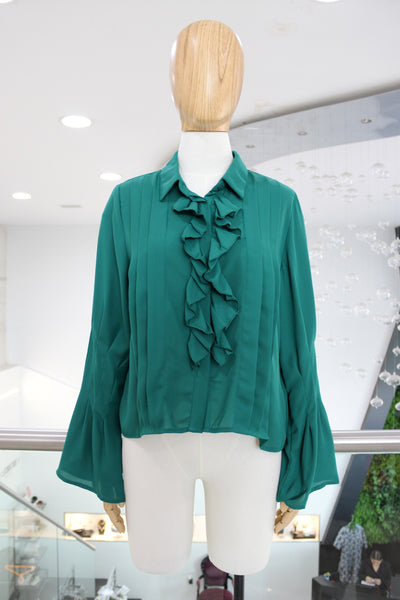 Blusa verde pliegues