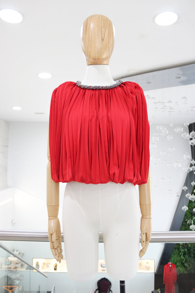 Blusa plisada 60/40%