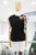 Blusa negra mascada