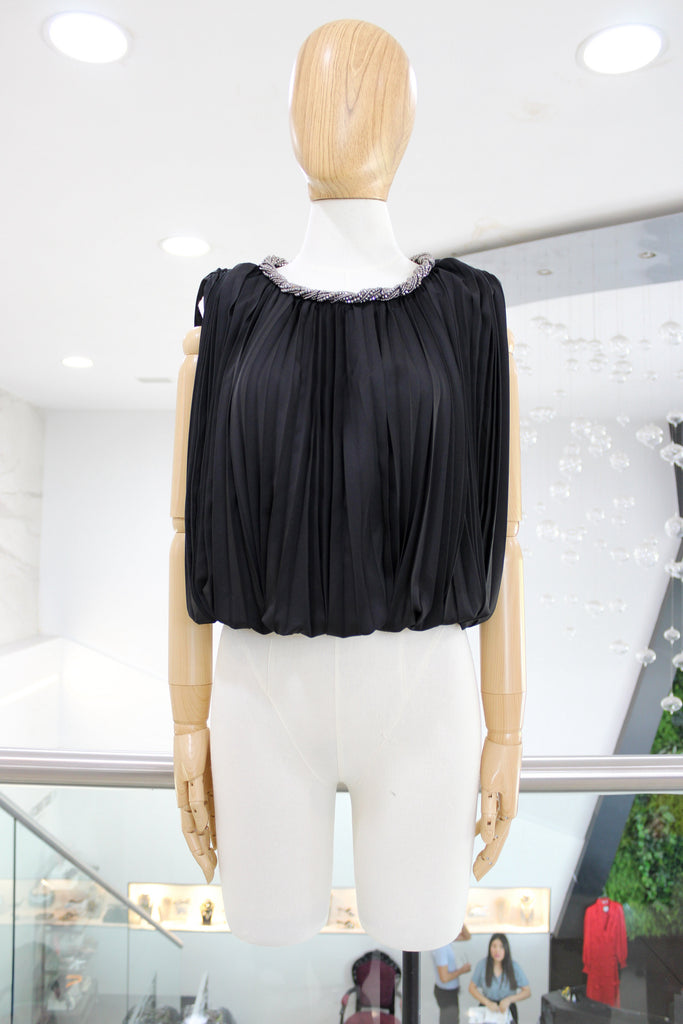 Blusa plisada 60/40%