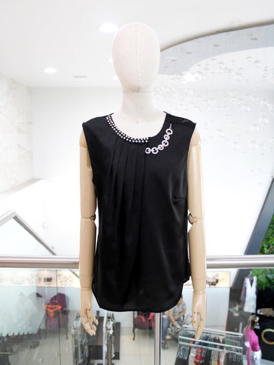 Blusa negra cadena 70/50%